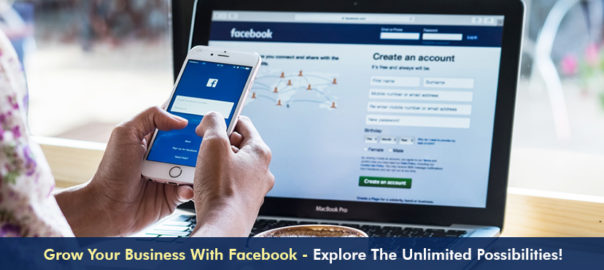 Person logging into Facebook account via mobile sitting before a laptop showing Facebook home page